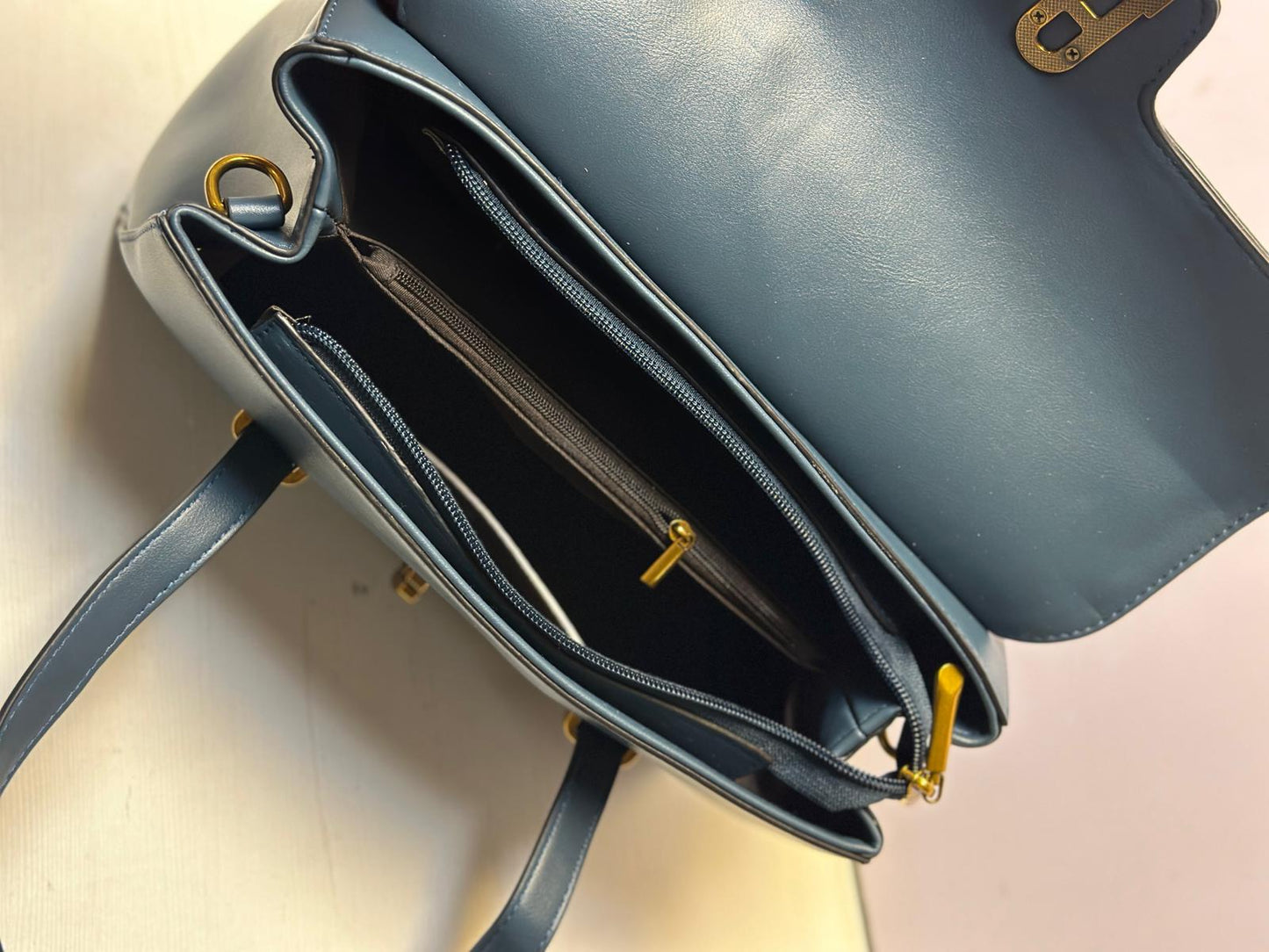 Metal trim satchel handbag